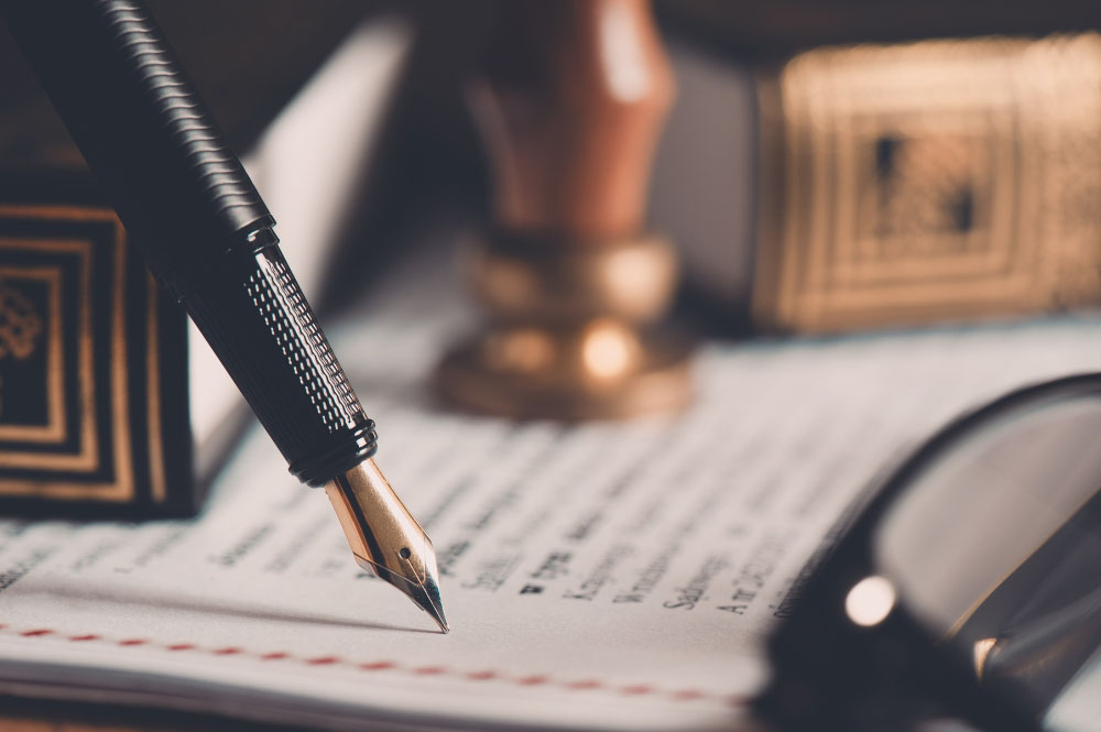 pen-writing-on-paper